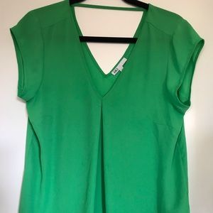 Green V-neck blouse